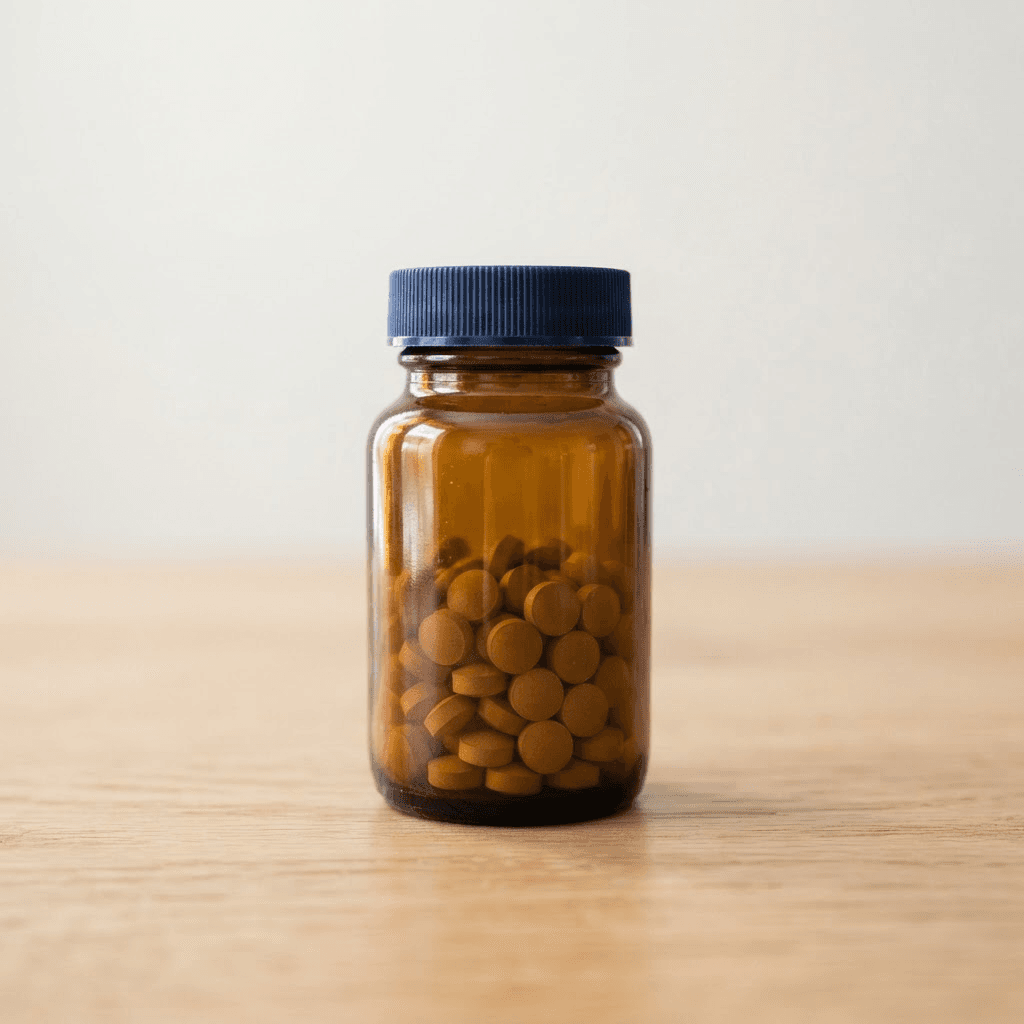 A Sildenafil pill bottle with a deep blue cap and a cream RX only label